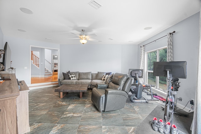 living room featuring ceiling fan