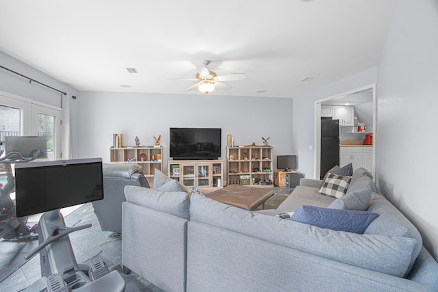 living room with ceiling fan