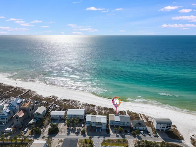 aerial view with a beach view and a water view