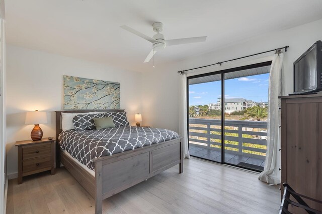 bedroom featuring light hardwood / wood-style floors, access to exterior, and ceiling fan