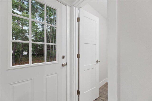 doorway featuring hardwood / wood-style floors