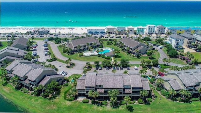 aerial view with a beach view and a water view