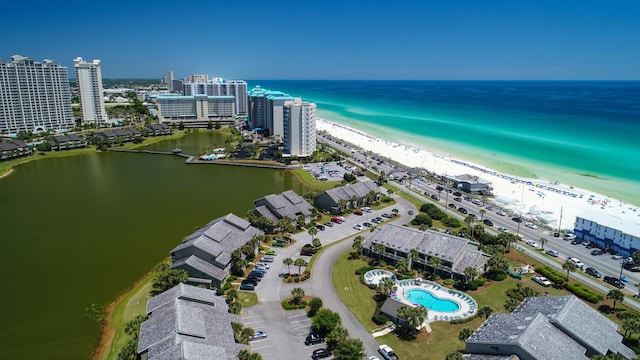 bird's eye view with a beach view and a water view