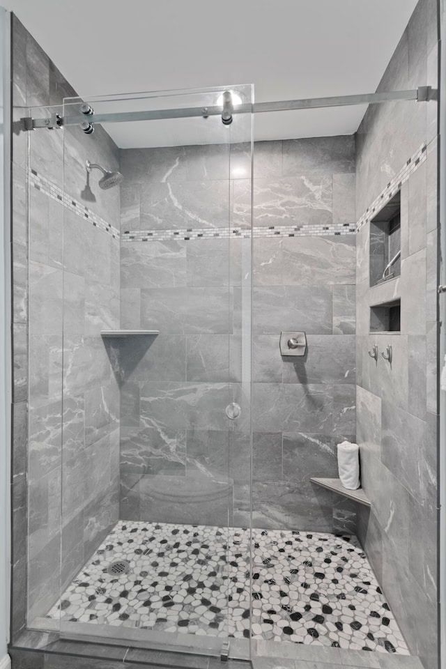 bathroom featuring walk in shower