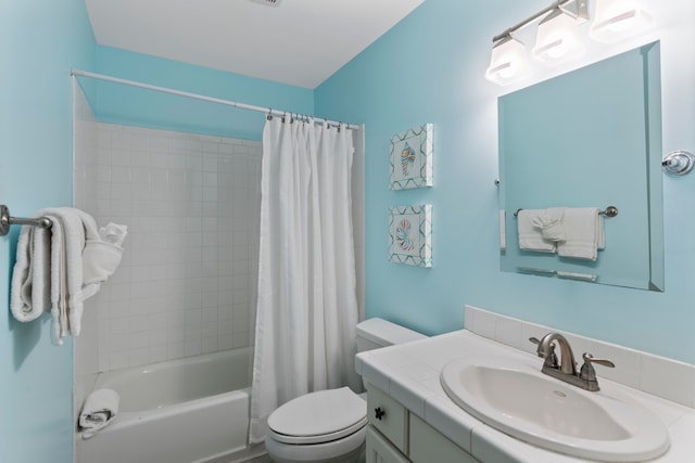 full bathroom featuring toilet, shower / tub combo, and vanity