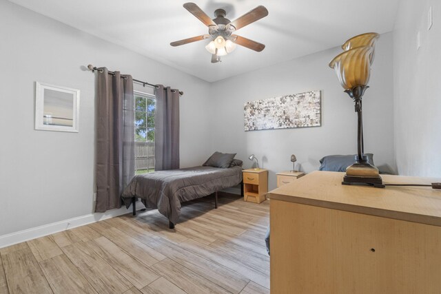 bedroom featuring ceiling fan and light wood-type flooring