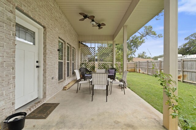 view of patio featuring ceiling fan