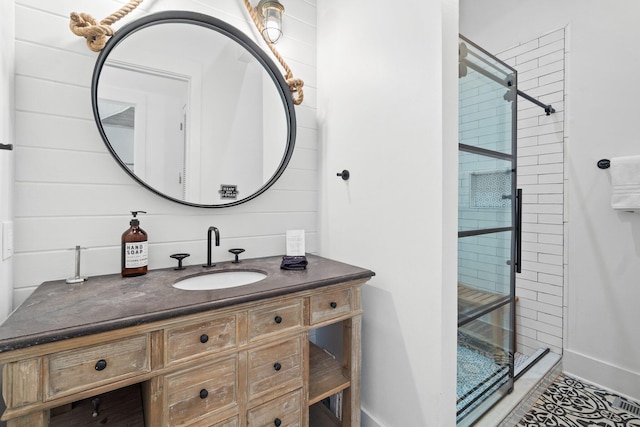 bathroom with vanity and an enclosed shower