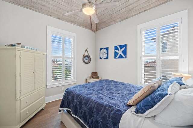 bedroom featuring ceiling fan, wooden ceiling, and hardwood / wood-style flooring