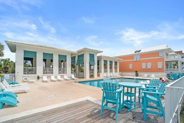 view of swimming pool featuring central AC unit