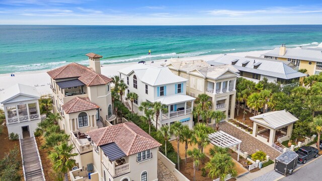 aerial view with a beach view and a water view