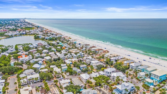 bird's eye view with a view of the beach and a water view