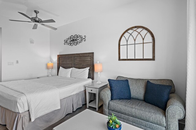 bedroom with ceiling fan and hardwood / wood-style floors