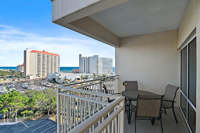 balcony featuring a water view