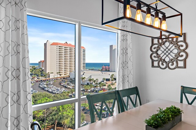 dining area featuring a water view