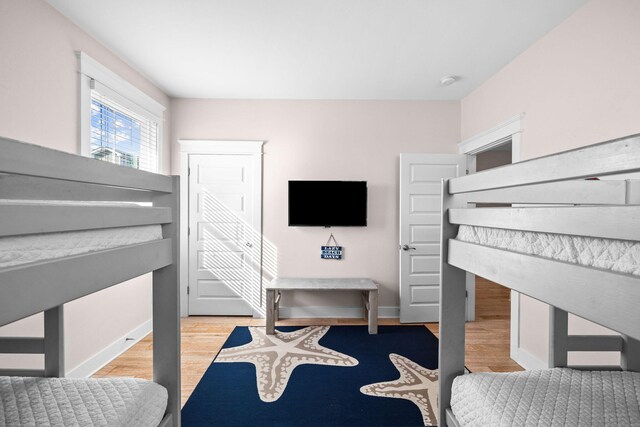 bedroom with light wood-type flooring