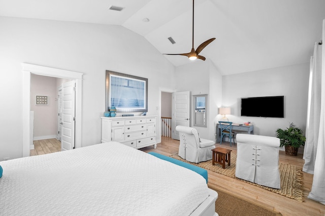 bedroom with high vaulted ceiling, light wood-type flooring, and ceiling fan