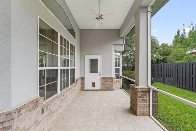 view of patio featuring ceiling fan