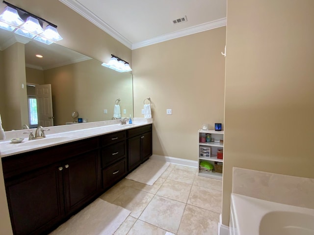 bathroom featuring tile patterned flooring, vanity, a bathtub, and crown molding