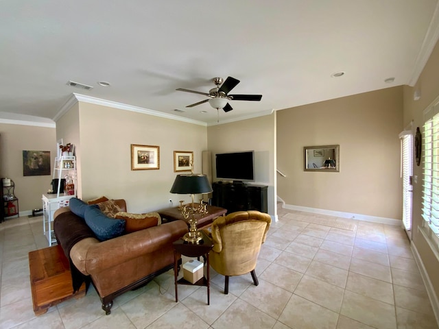 living room featuring light tile patterned flooring, ceiling fan, and crown molding