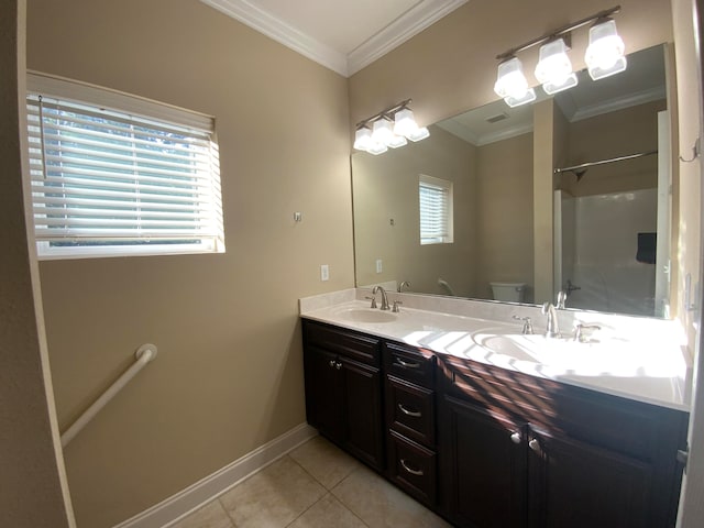 bathroom featuring toilet, tile patterned flooring, vanity, crown molding, and a shower