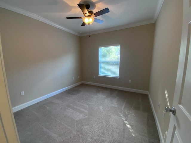 unfurnished room with carpet flooring, ceiling fan, and crown molding