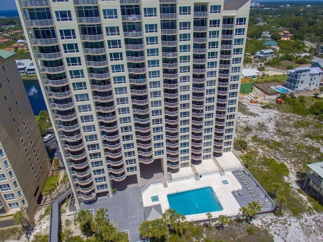 view of property with a community pool