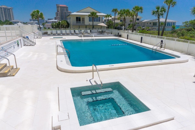 view of swimming pool featuring a patio