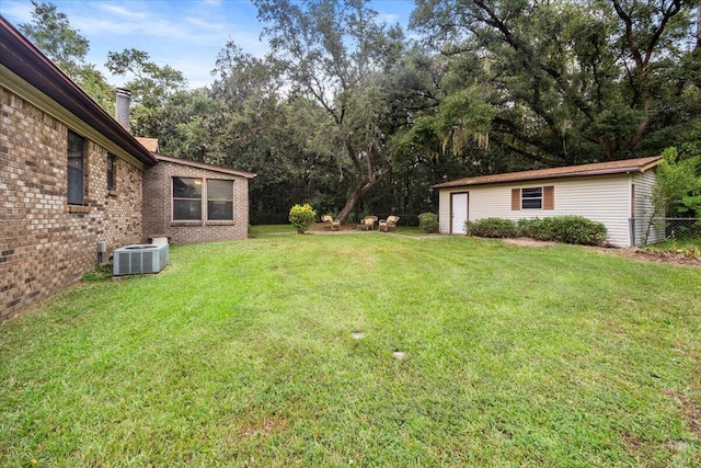 view of yard featuring central AC unit