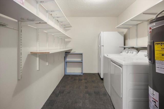 laundry room with a textured ceiling, separate washer and dryer, dark colored carpet, and water heater