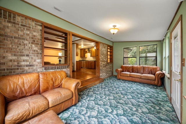 carpeted living room with lofted ceiling