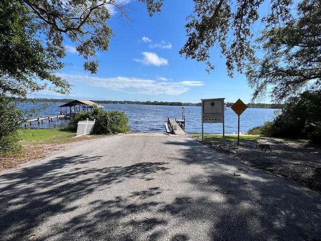 view of dock with a water view