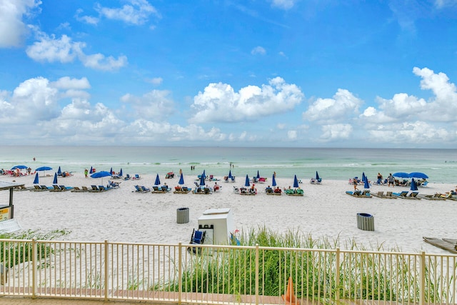 view of water feature with a beach view