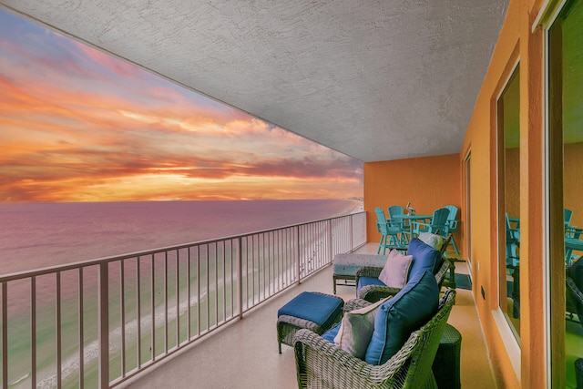 balcony at dusk with a water view