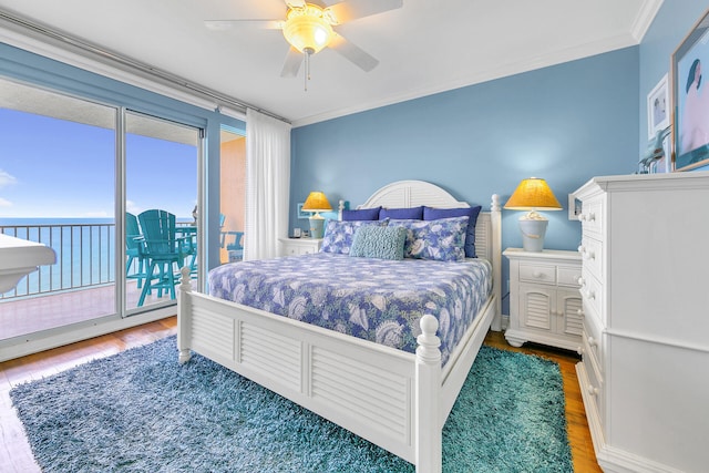 bedroom featuring crown molding, access to exterior, ceiling fan, and hardwood / wood-style flooring