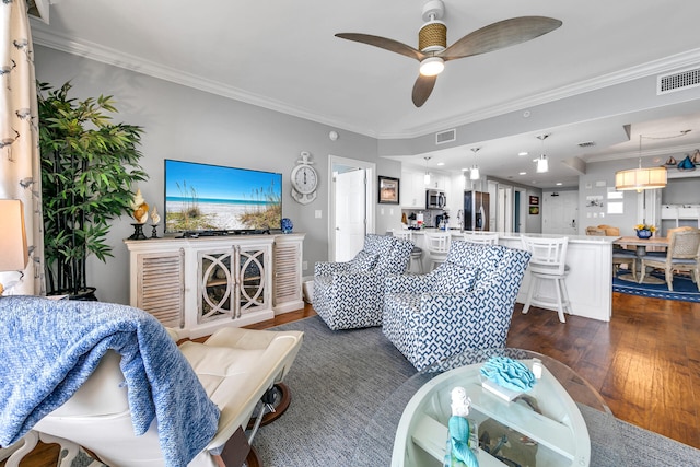 living room with ceiling fan, dark hardwood / wood-style floors, and crown molding