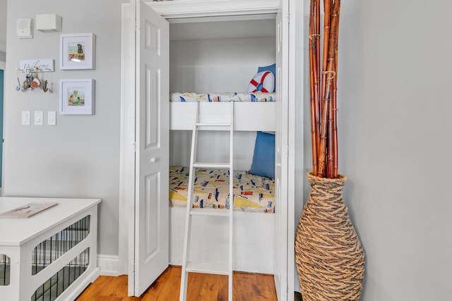 bedroom with light hardwood / wood-style floors