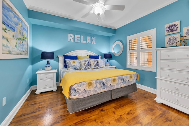 bedroom featuring crown molding, ceiling fan, and dark hardwood / wood-style floors