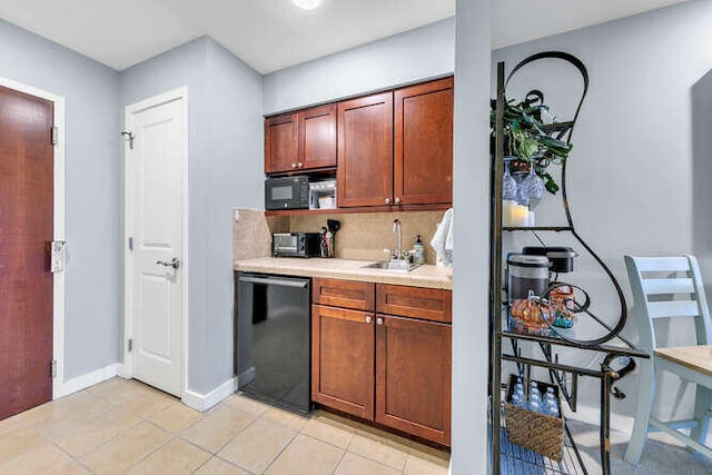 kitchen with decorative backsplash, black appliances, light tile patterned floors, and sink