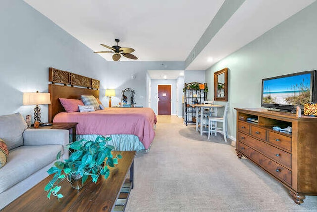 bedroom with light carpet and ceiling fan