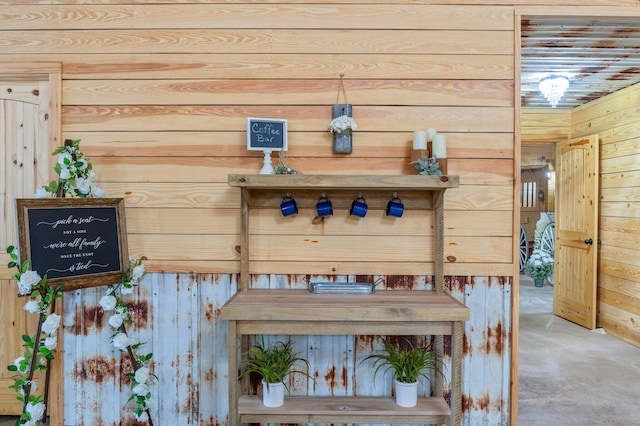 room details with concrete floors and wooden walls