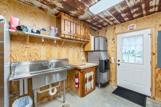 kitchen with wood walls