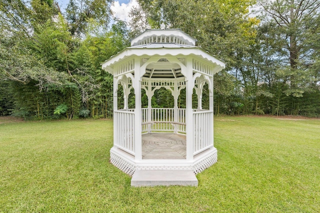 view of outdoor structure featuring a yard and a gazebo