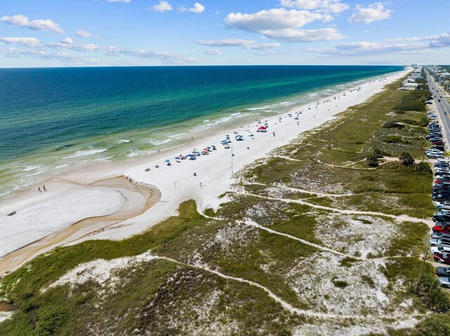 aerial view featuring a beach view and a water view