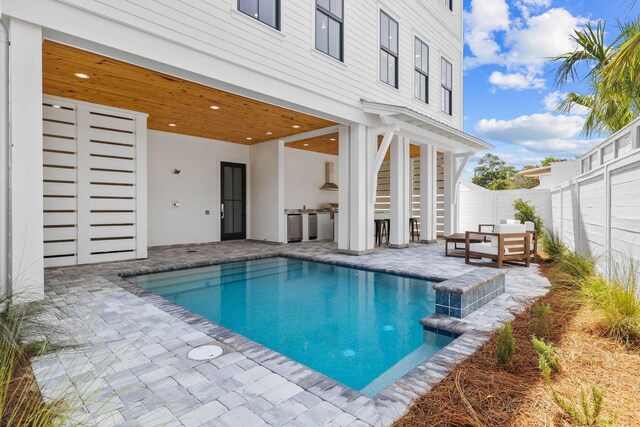 view of pool with a patio