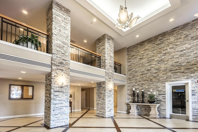 4776 Westwinds Dr Unit 4776, Miramar Beach, FL 32550 - building lobby featuring a high ceiling and recessed lighting