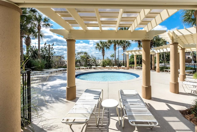 4776 Westwinds Dr Unit 4776, Miramar Beach, FL 32550 - community pool with a pergola and a patio