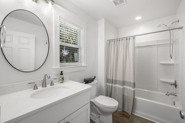 full bathroom featuring vanity, toilet, shower / tub combo, and hardwood / wood-style flooring