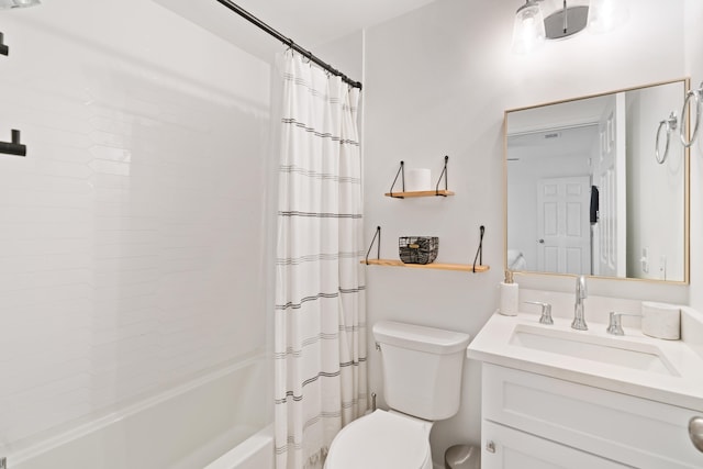 full bathroom featuring shower / tub combo with curtain, vanity, and toilet