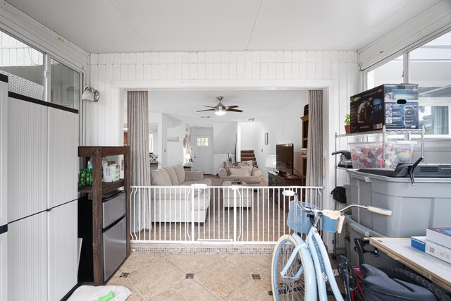 kitchen with a wealth of natural light and ceiling fan